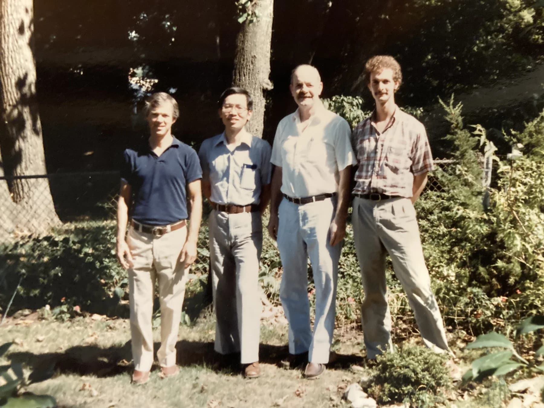 Archival group photograph with Robert W. Smith and a young Allen Pittman at right