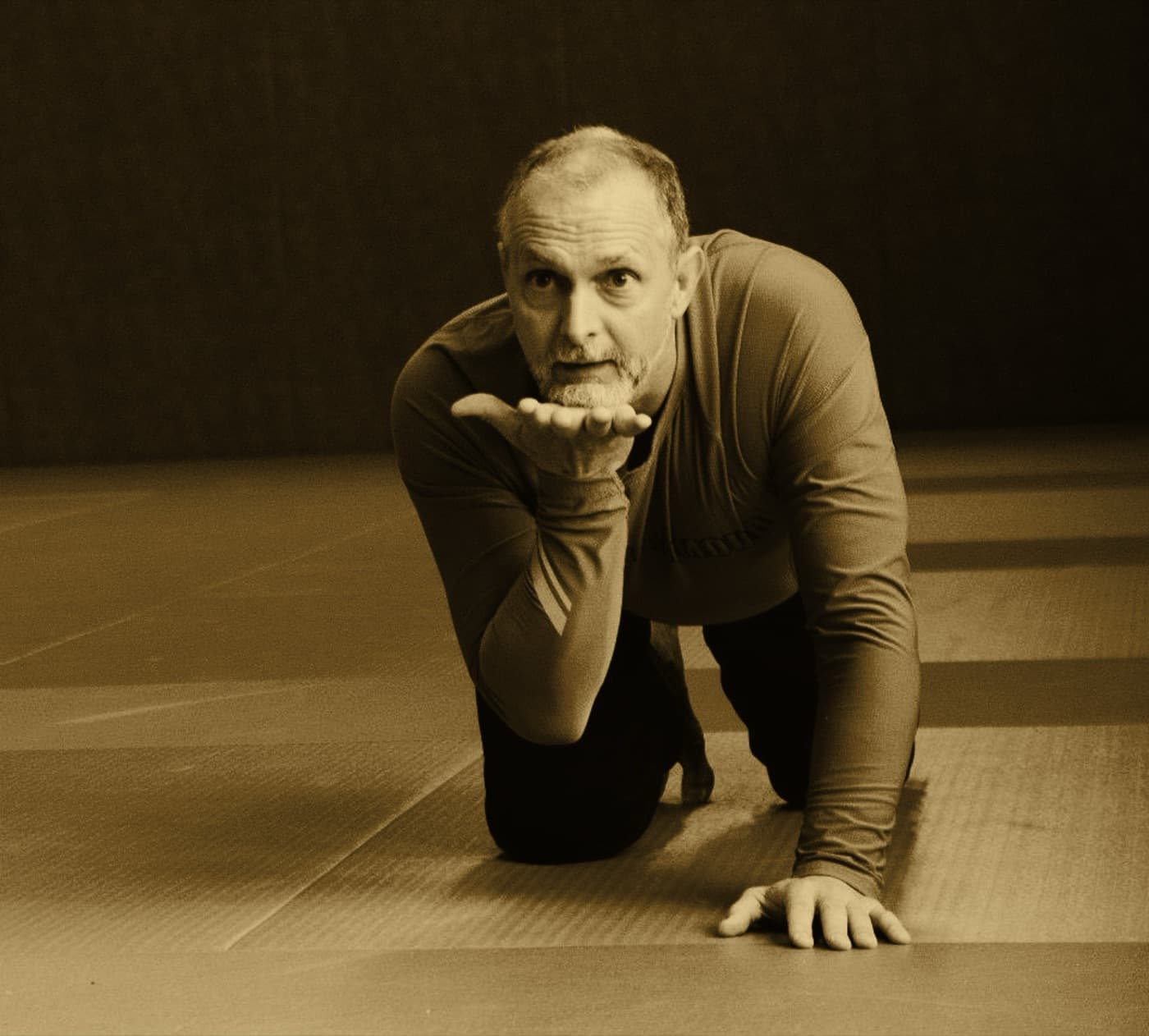 Allen Pittman exploring a supported crawling position in Wisdom of the Body