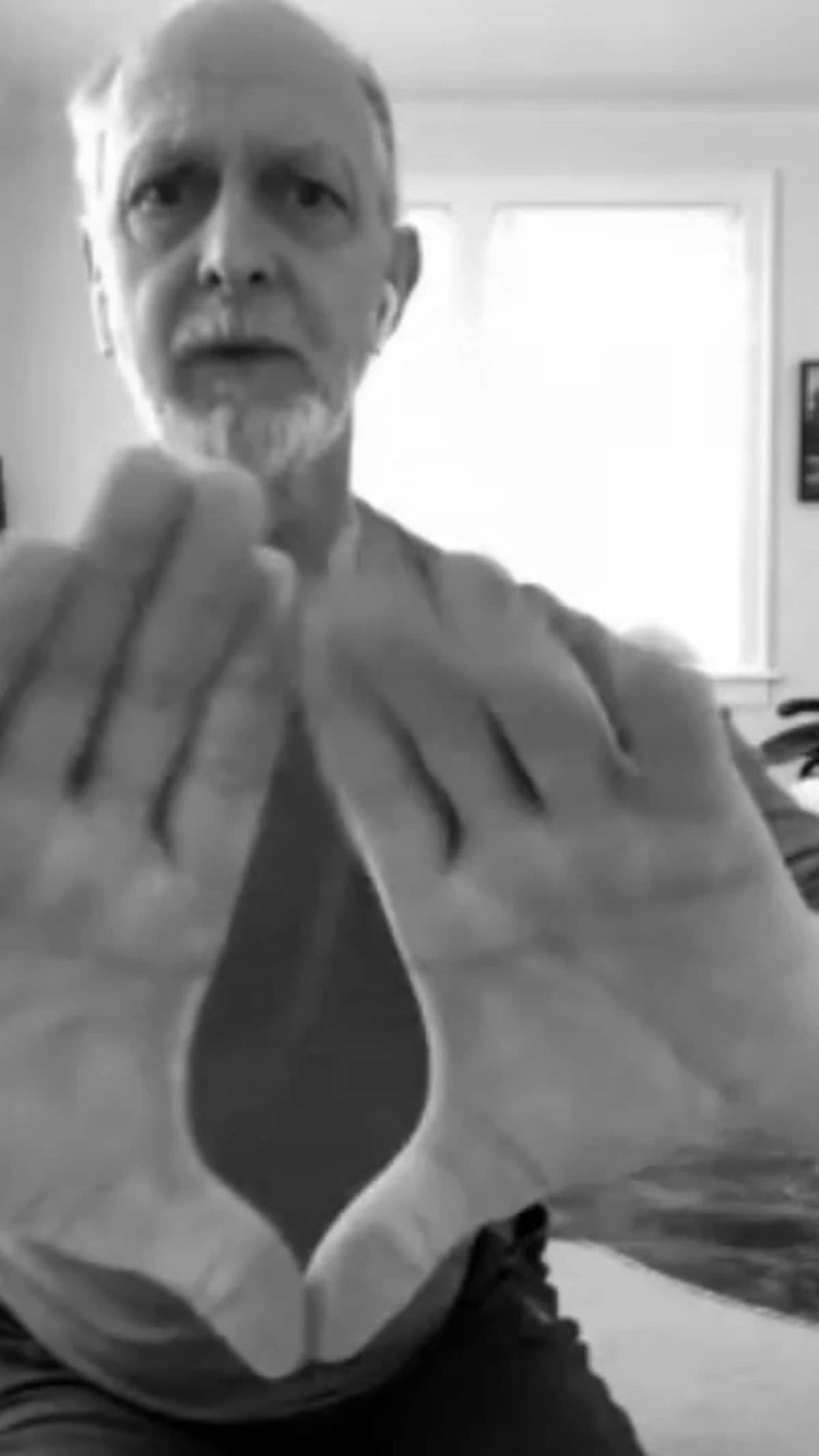 Allen Pittman demonstrating hand work in an Egyptian yoga class